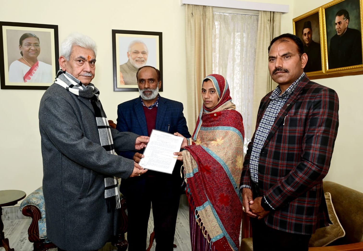 Lt Governor hands over appointment letter to wife of Martyr Hav Abdul Majid