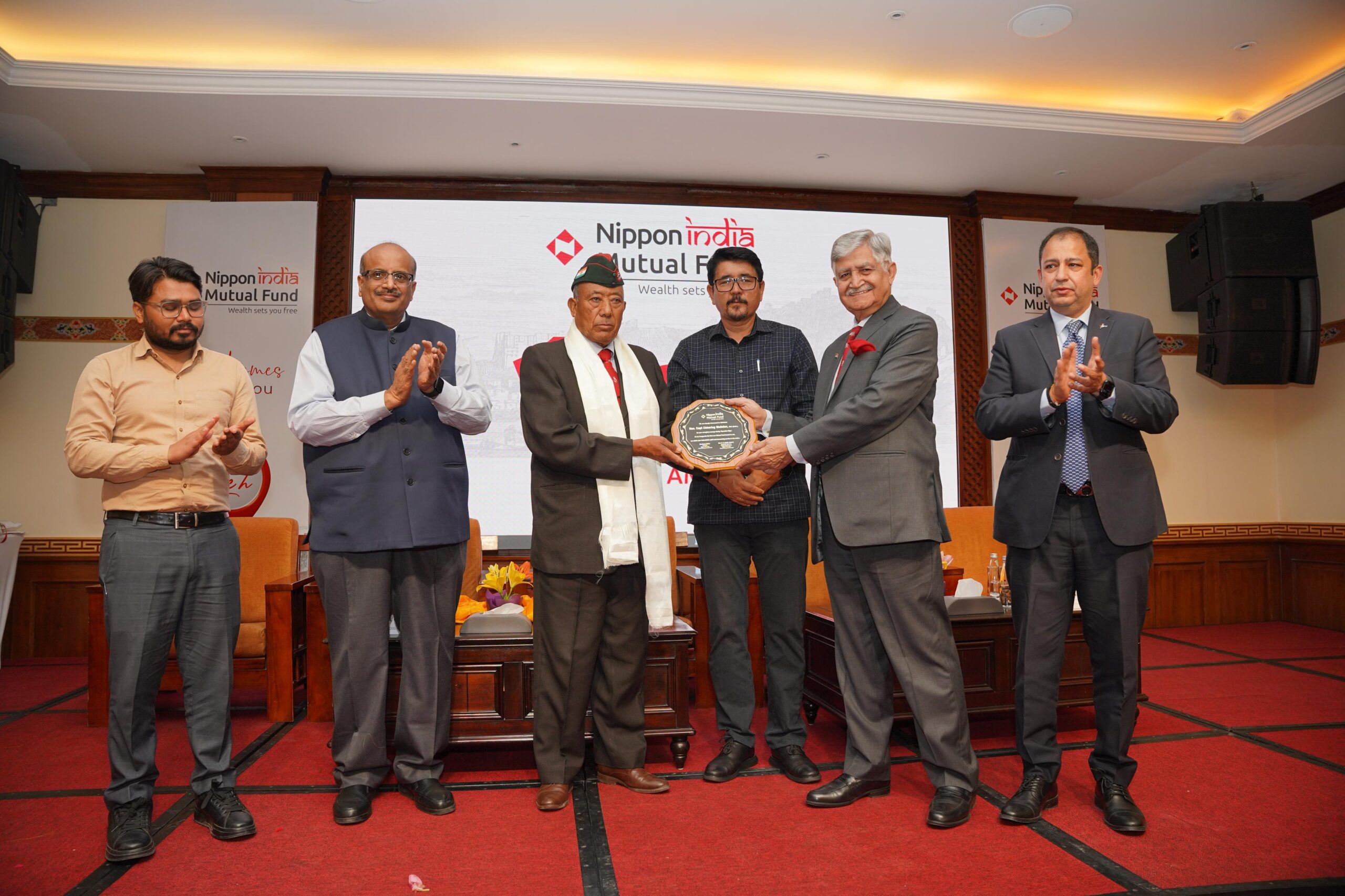 Adv. Tashi Gyalson, Chief Executive Councillor/Chairman, LAHDC Leh, and Ronil Singh Dono, Deputy Commissioner, Leh along with Retd General VP Malik, Independent Director, Nippon India Mutual Fund and Sundeep Sikka, ED and CEO, Nippon India Mutual Fund felicitated five Gallantry Awardees from the Indian Army — including Maha Vir Chakra recipients from the Leh-Ladakh region — during the inauguration of Nippon India Mutual Fund’s industry-first branch in Leh. This milestone marks a significant leap toward enhancing financial inclusion in the Himalayan frontier Adv. Tashi Gyalson, Chief Executive Councillor/Chairman, LAHDC Leh, and Ronil Singh Dono, Deputy Commissioner, Leh along with Retd General VP Malik, Independent Director, Nippon India Mutual Fund and Sundeep Sikka, ED and CEO, Nippon India Mutual Fund felicitated five Gallantry Awardees from the Indian Army — including Maha Vir Chakra recipients from the Leh-Ladakh region — during the inauguration of Nippon India Mutual Fund’s industry-first branch in Leh. This milestone marks a significant leap toward enhancing financial inclusion in the Himalayan frontier