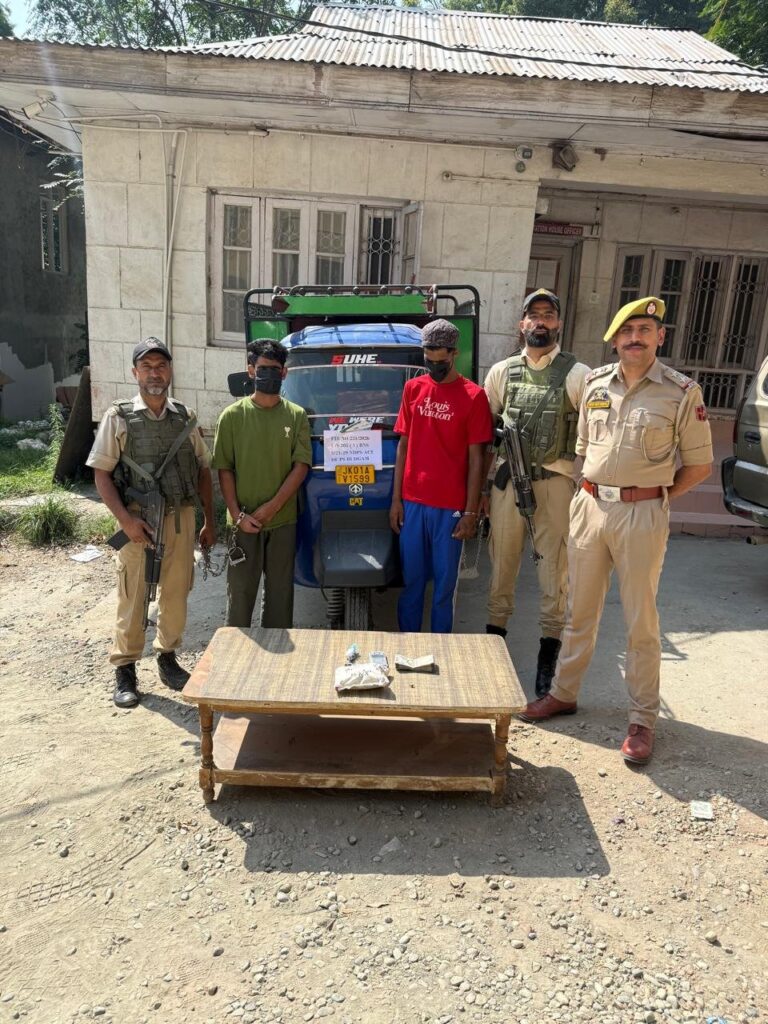 Budgam Police Solve Housing Colony Ompora Theft Case; 2 Arrested.In FIR No. 231/2026, PS Budgam, police recovered ₹9.47 lakh cash, stolen gold ring (~3g), 4.32g suspected contraband, digital weighing machine & 2 three-wheelers. ₹2.70 lakh in bank accounts frozen